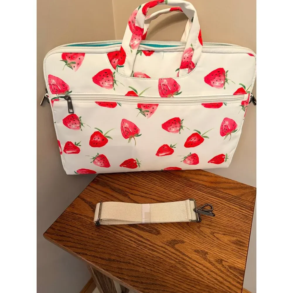 Canvaslove laptop sleeve features strawberry print, detachable shoulder strap